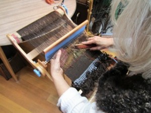 Andrea weaving using the Saori technique